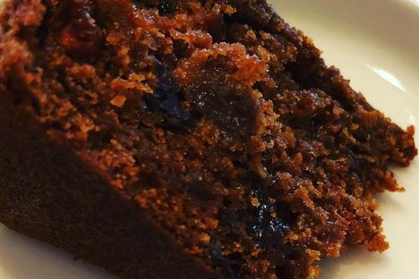 A slice of black cake baked by Mrs. Annemarie Charles, from San Fernando, Trinidad.