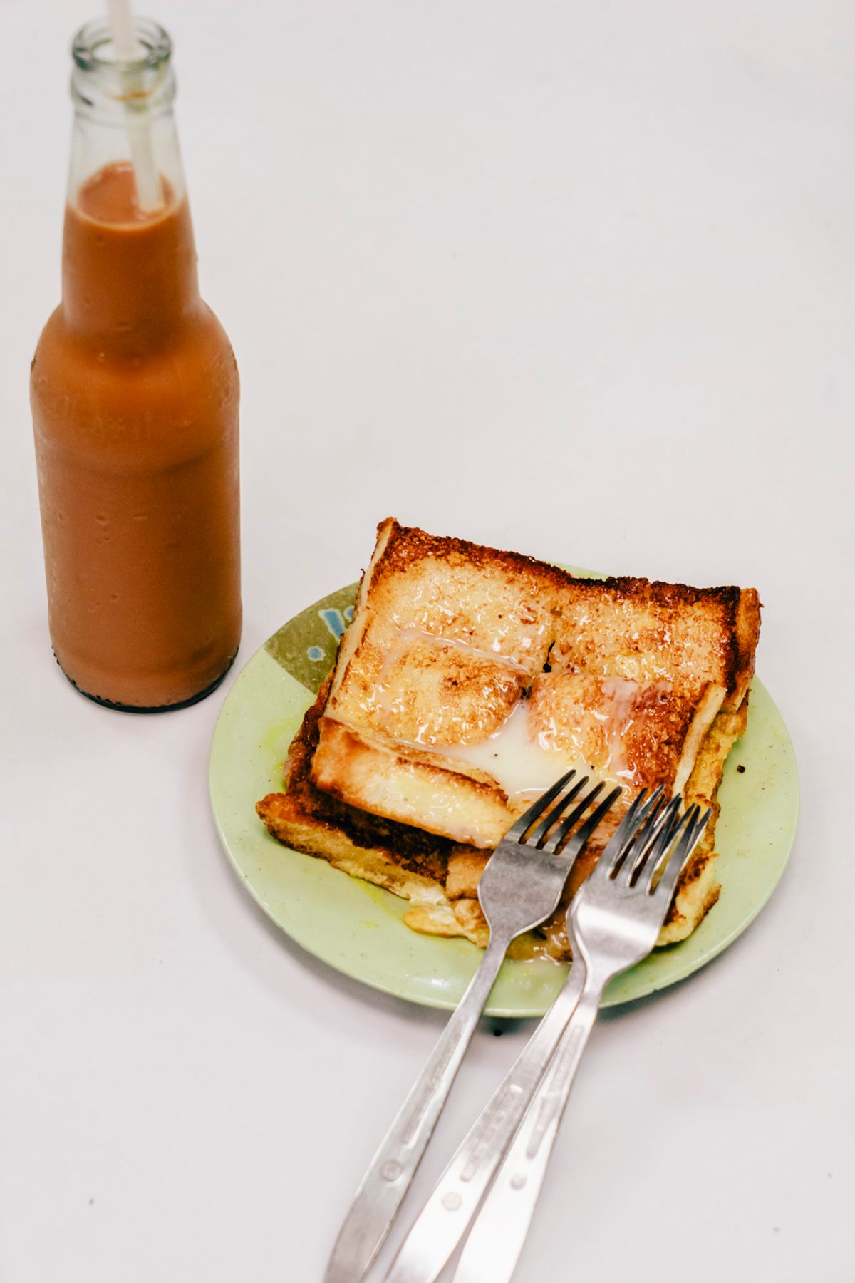 Toast drizzled in condensed milk is a cha chaan teng staple.