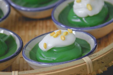 Pandan and mung bean topped with coconut cream.
