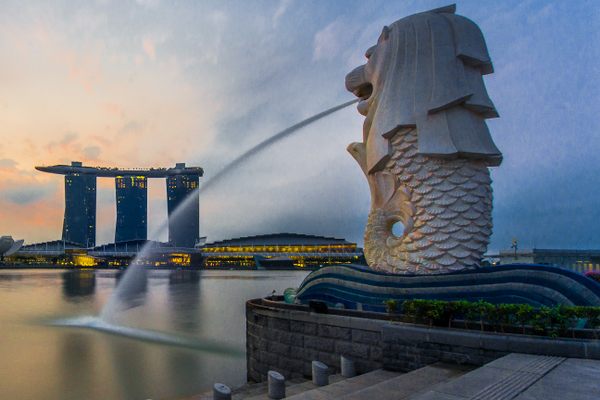 A rear view of the Merlion statue and Marina Bay Sands.