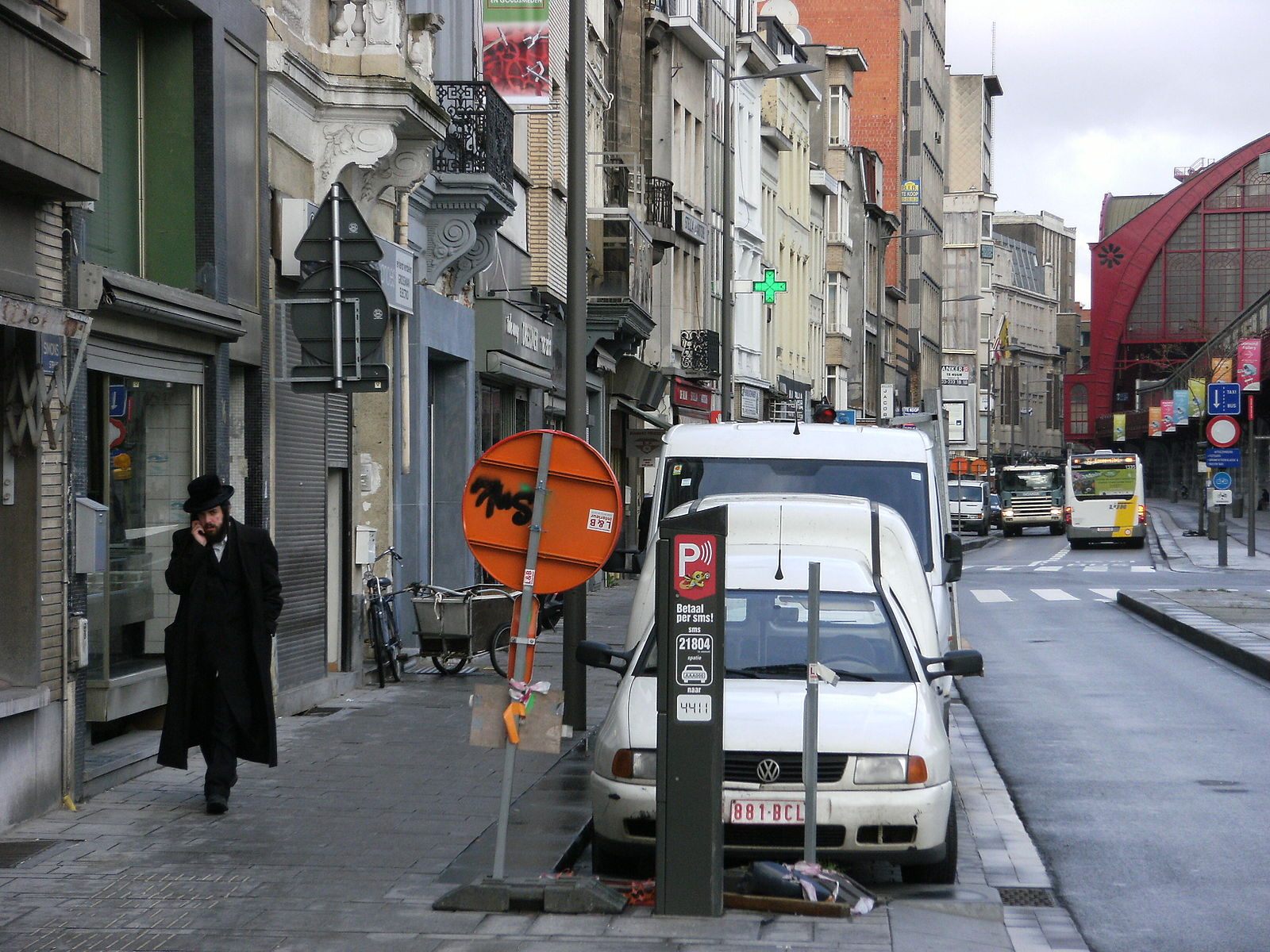 A man walks alone in Antwerp.