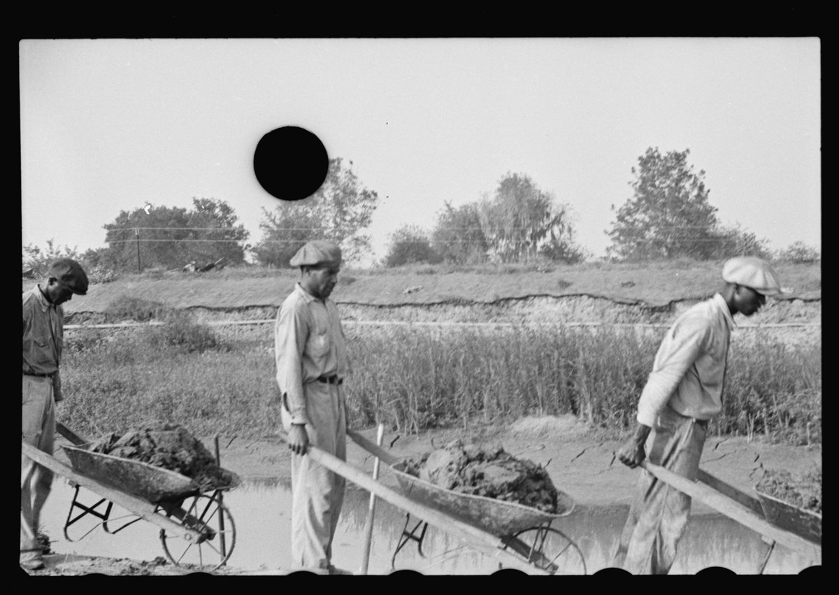<em>Untitled photo, possibly related to: Levee workers, Plaquemines Parish, Louisiana.</em>