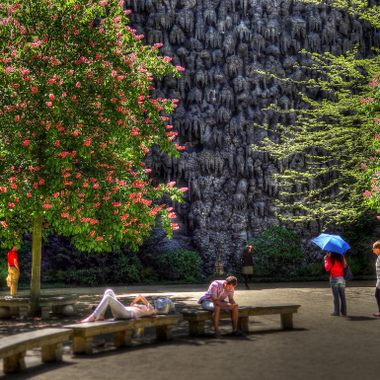Visitors examine the Dripstone Wall for secret passageways