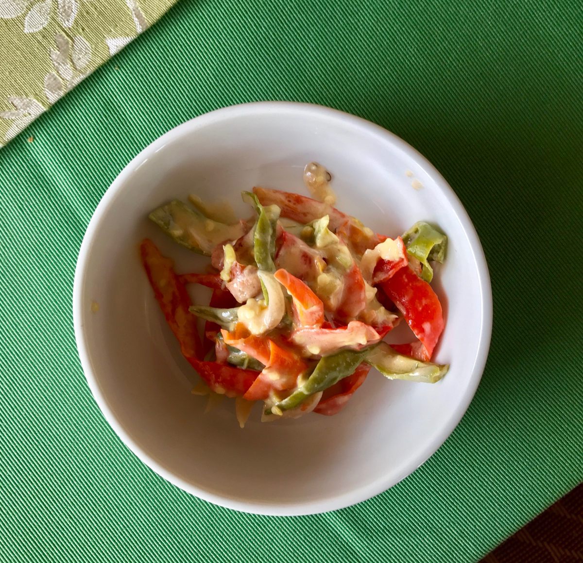 A bowl of homemade ema datshi, a popular Bhutanese dish made with yak cheese.