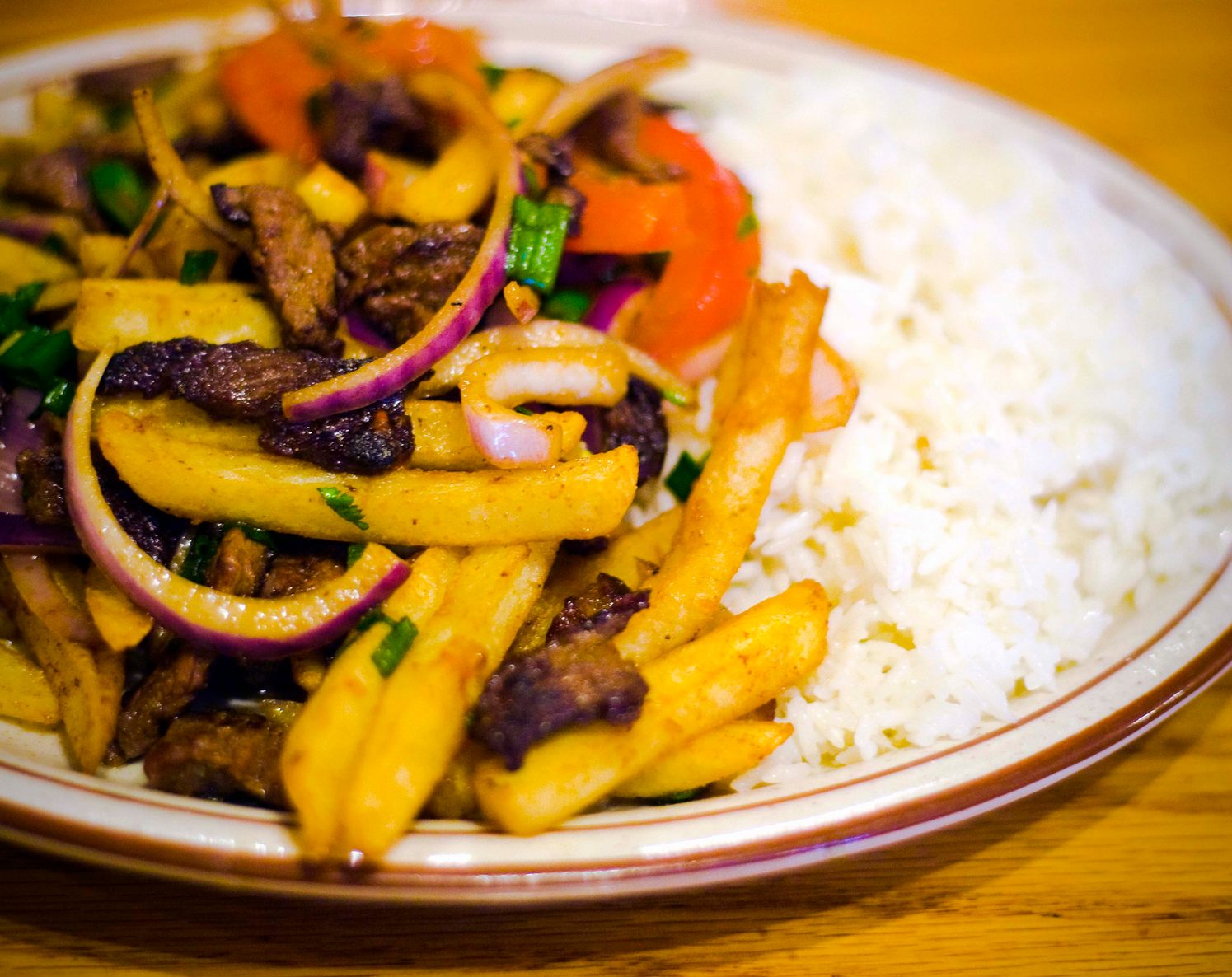 <em>Lomo saltado</em> is not a dip, but is a delicious way to eat fries.