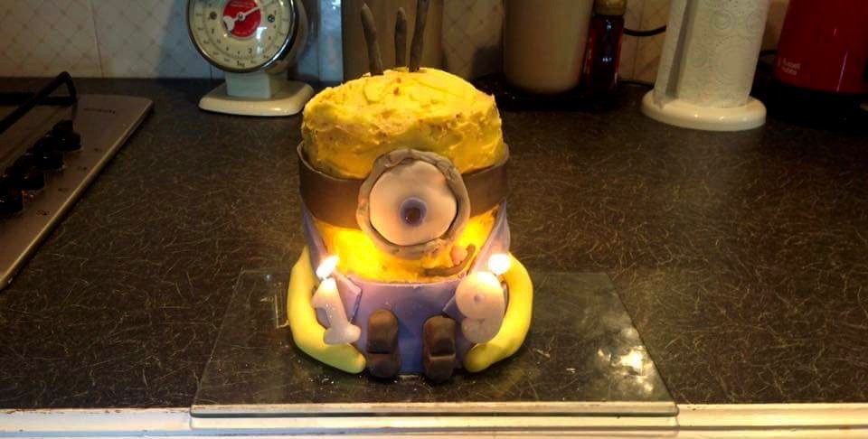 The height of the minion craze immortalized in birthday cake form. Note the long, long arms.