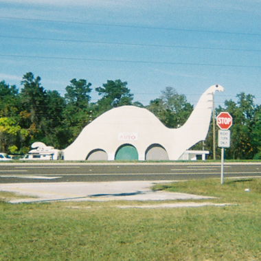 The dinosaur is a prime example of the “novelty architecture” popularized with the rise of the automobile. 