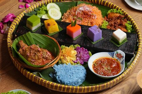 To get acquainted with Penang's rich food culture, start with finding as many colorful iterations of kuih as possible, then dive deeper into the island's history to understand how its vibrant food scene came to be.