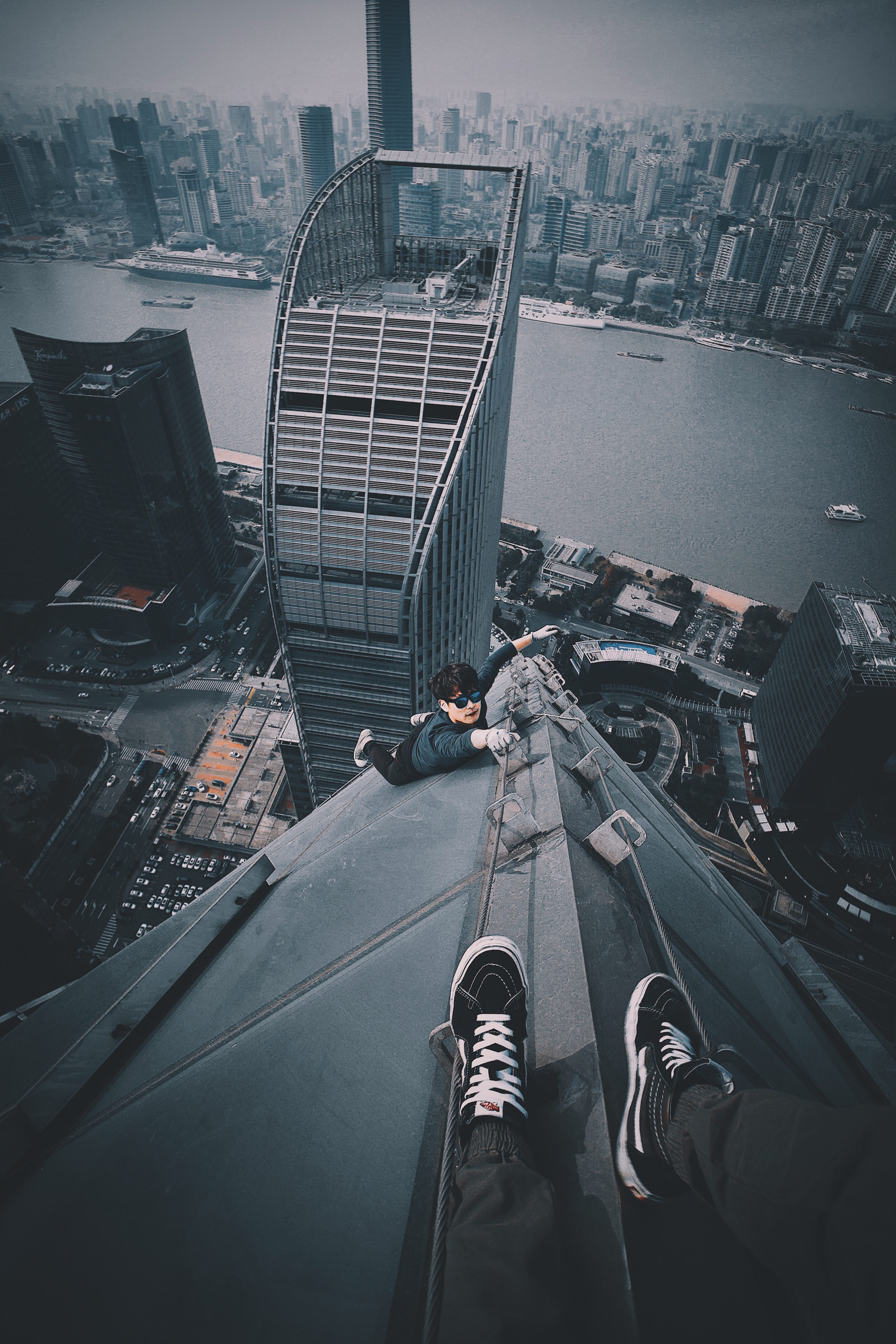 One of cocoanext's many vertigo-inducing photos taken atop the high-rises of Shanghai.