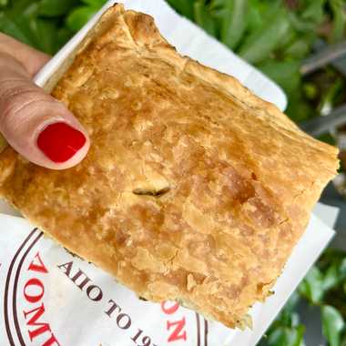 These flaky, savory pies are baked fresh daily.