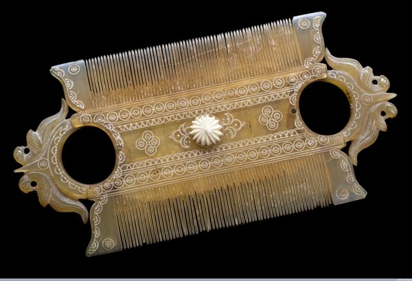 Who invented deals the first comb