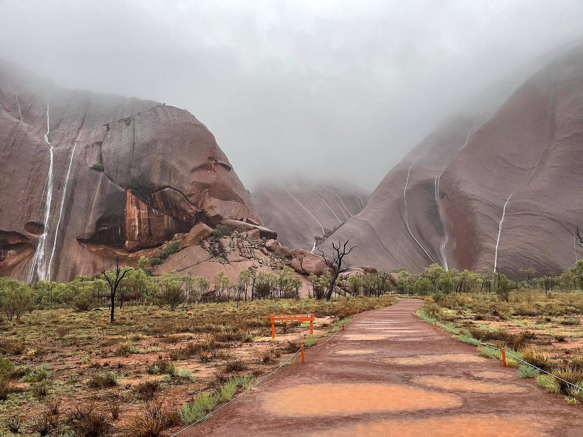 Heavy Rain Brought Spectacular Waterfalls to Australia's Most Famous Rock
