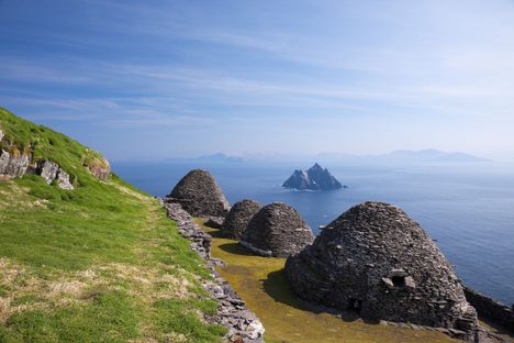 Beehive huts on Skellig Michael, looking across to Little Skellig. 