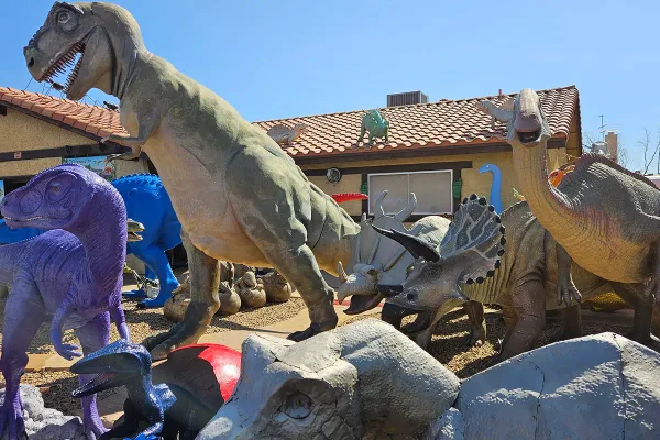 Prehistoric creatures roam the grounds of the Dinosaur House.
