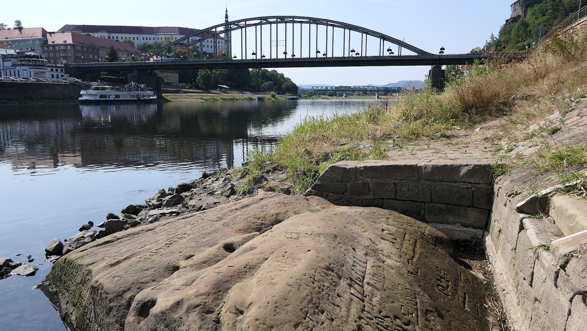One of the most famous hunger stones, near Tyrs Bridge in Děčín, Czechia.