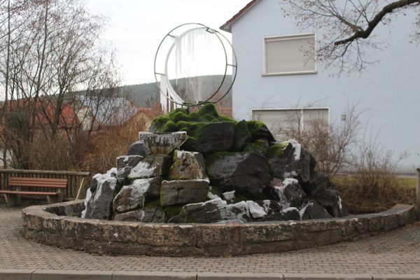 Rhönraddenkmal Schönau an der Brend in winter.