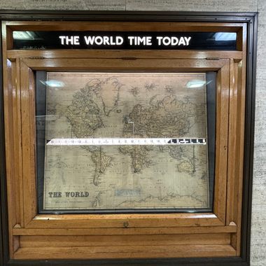 This unusual linear clock shows the time all around the world.