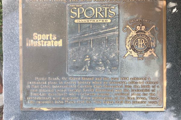 The plaque honors the 50th anniversary of Sports, Illustrated.
