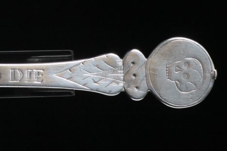 The top of a Strickland spoon. 