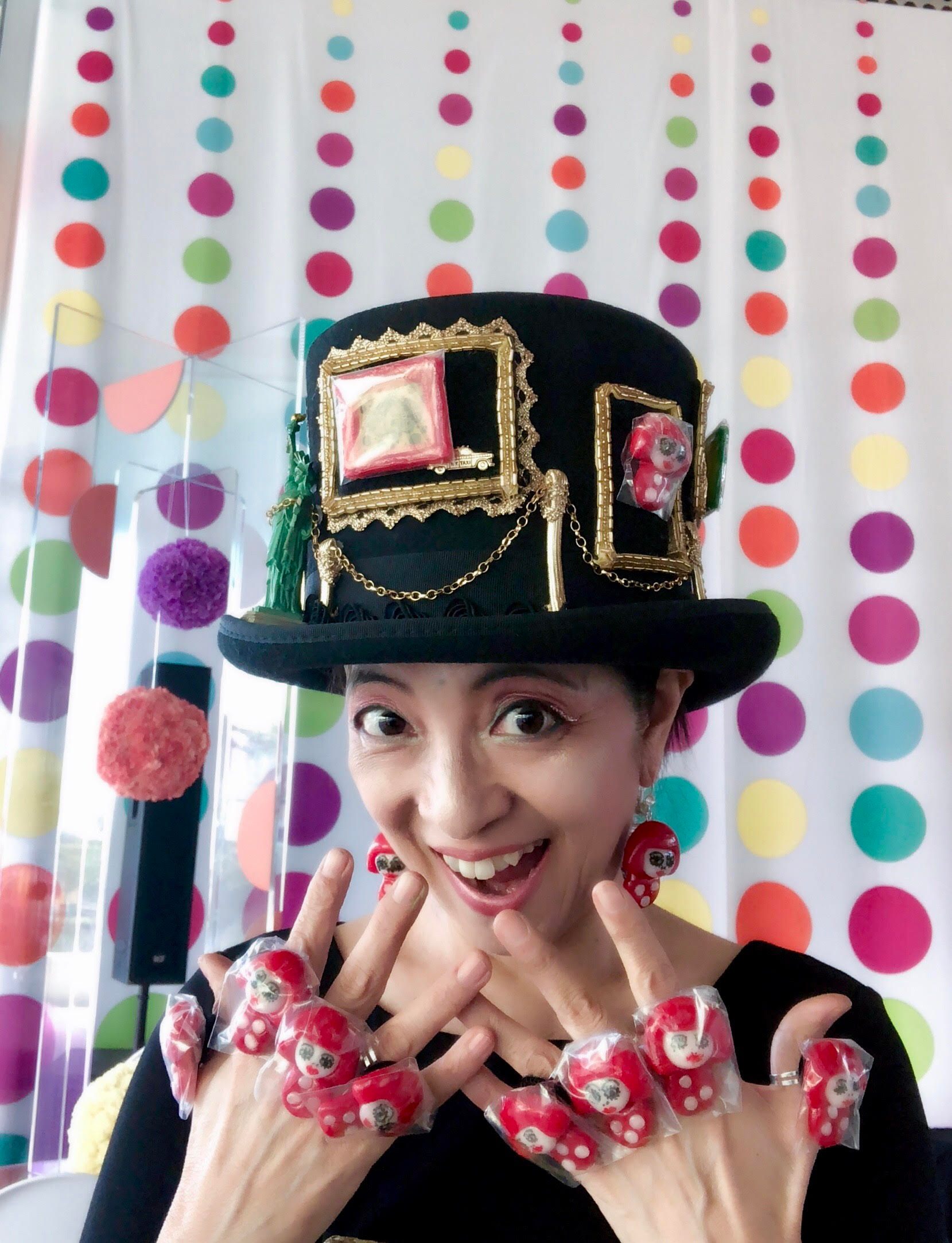 Miyuki, displaying some of her work.