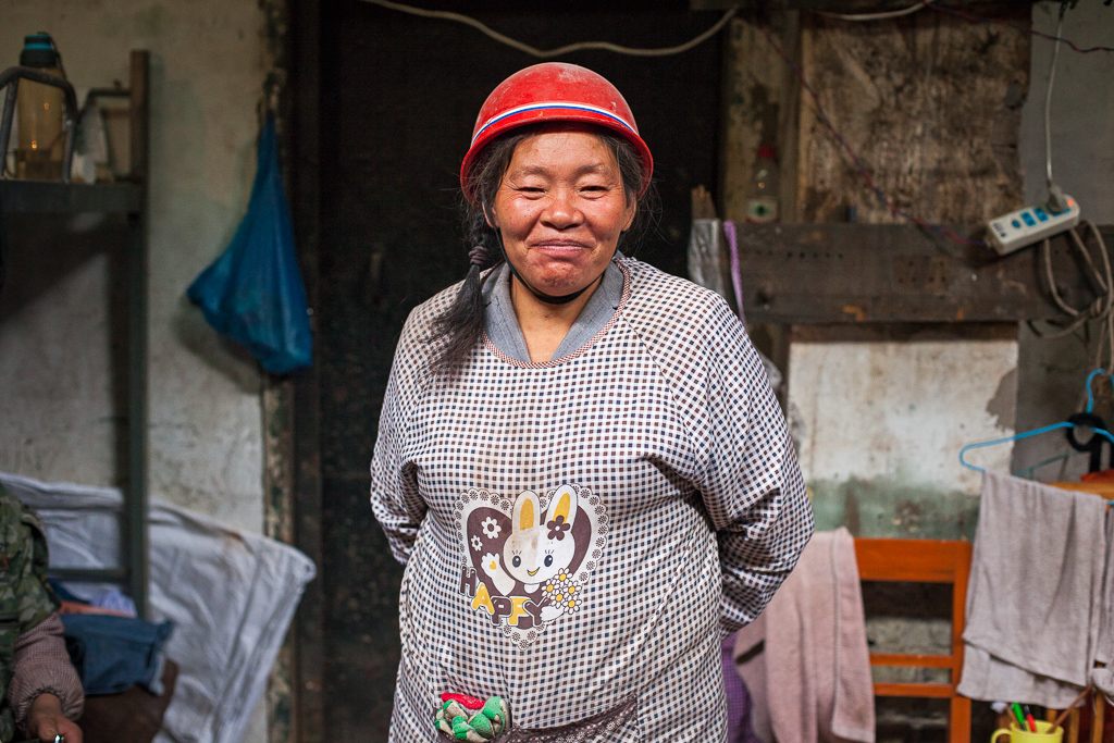 Many of the workers in the tunnels are women who share the same accommodation with the men. There is a small wall but for most of the day they gather in the same area to chat and relax.