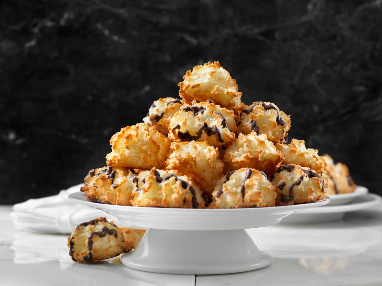 For extra decadence, some coconut macaroons come with a drizzle of chocolate. 