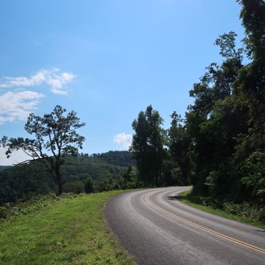 Blue skies and green landscapes.