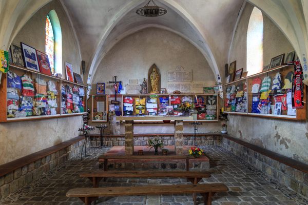 Rugby jerseys line the walls inside the chapel.