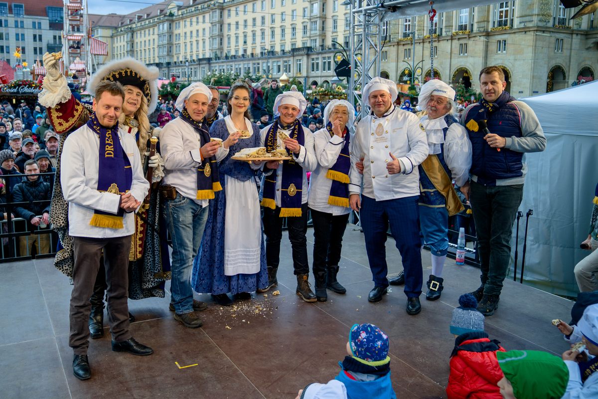 Costumed marchers represent the story of the stollen.