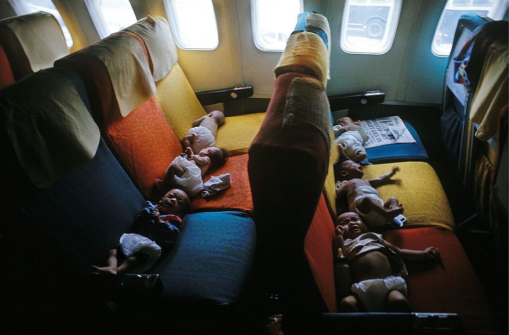 Babies from South Vietnam on a flight to the U.S. during "Operation Babylift".  (Photo: Jean-Claude Francolon/Gamma-Rapho/Getty Images)