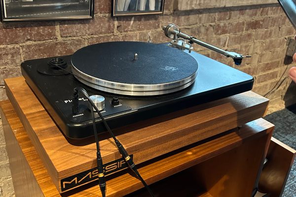 Record players with headphones make for an excellent listening experience.