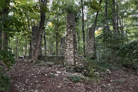 Ruins of a walkway or parapet are scattered among campsites at South Bass Island State Park