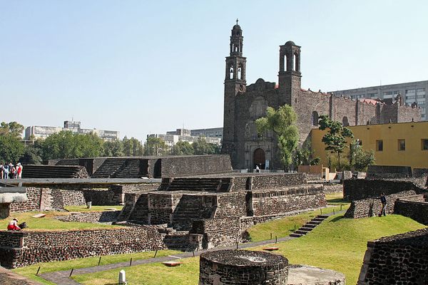 The ruins of Tlatelolco with the backdrop of the Plaza de las Tres Culturas.
