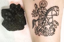 St. George and the Dragon tattoo motif as tattooed from a stencil block that dates to 200 or 300 years ago.
