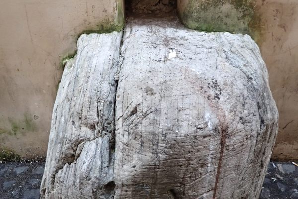 The base of the column with its deep gash