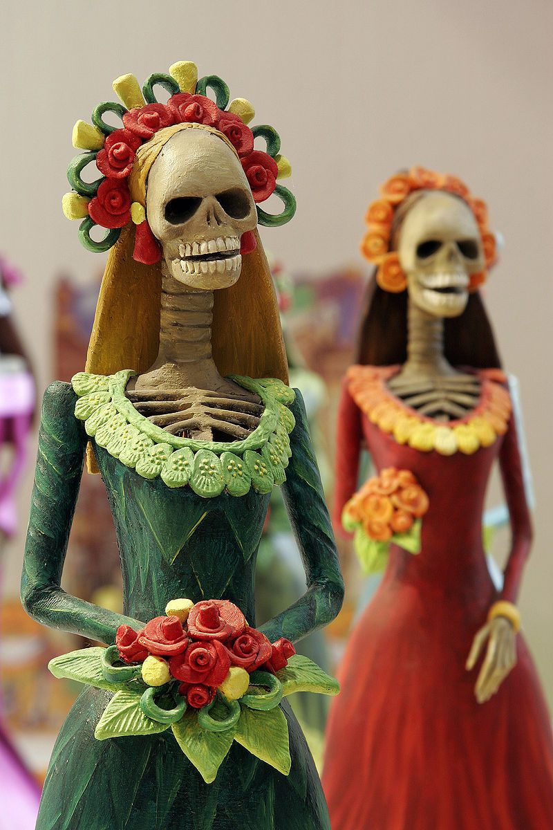 Catrina, a high-society skeleton popularized by early 20th century political cartoonist José Guadalupe Posada.