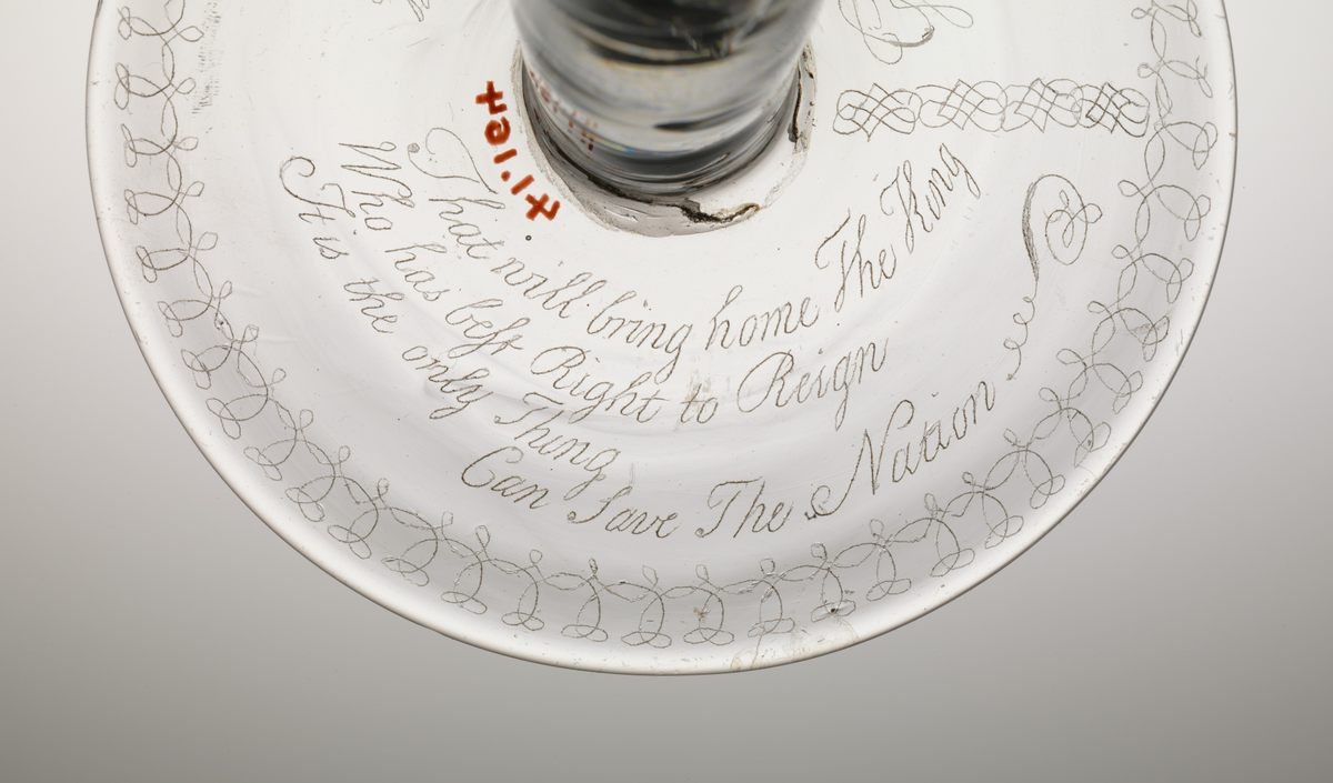 This Jacobite glass, which is much less coy, is on view at the Metropolitan Museum of Art in New York City, gallery 509.