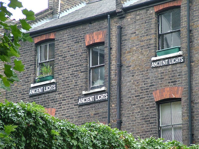 "Ancient Lights" signs below windows in Clerkenwell, London.