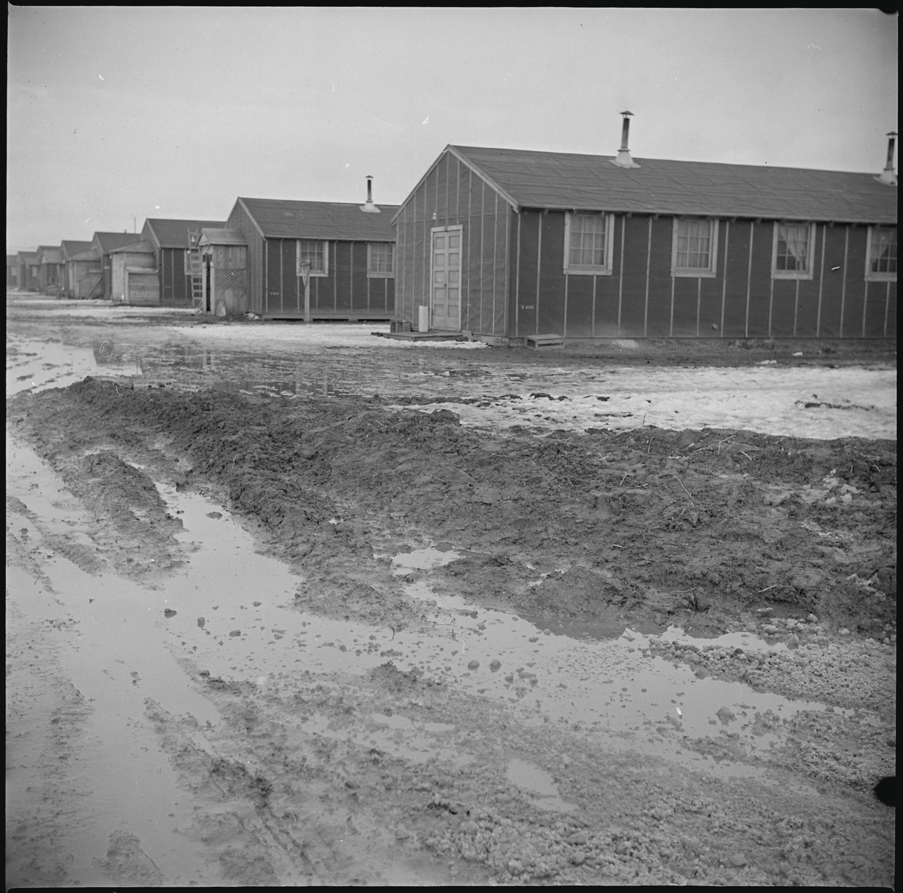 Muddy conditions in the Tule Lake concentration camp in February 1943. At its peak population, nearly 19,000 Japanese Americans were incarcerated in this Northern California camp.