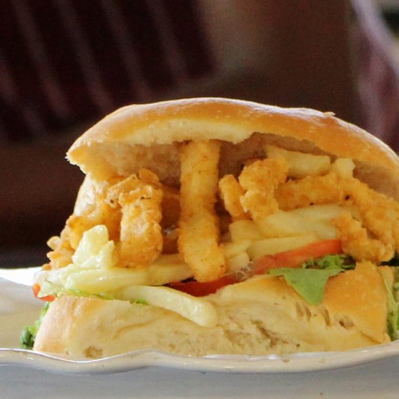 A Gatsby piled high with calamari and chips.
