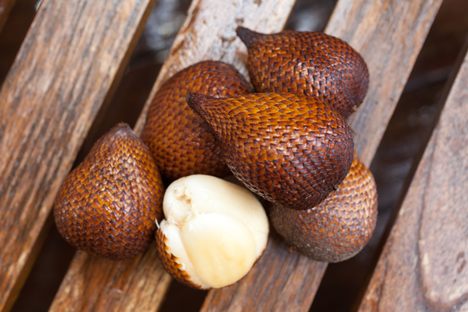 Snake skin outside, tart pulp inside.