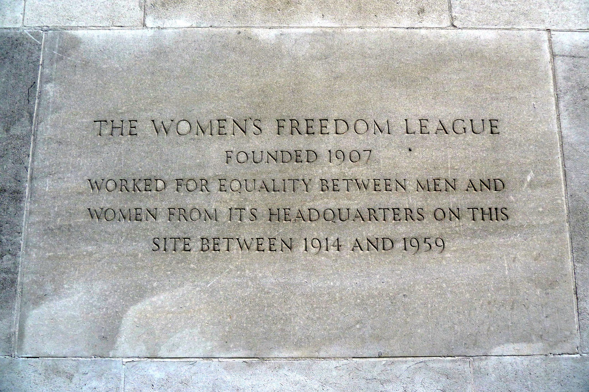 The plaque on the site of the former Club and Cafe.