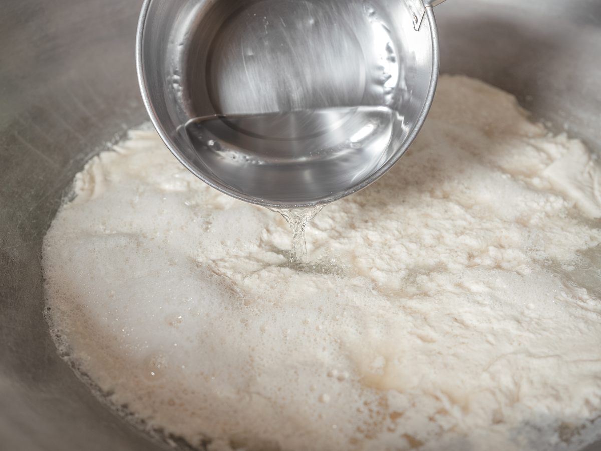Muddy volcanic brine is added to the soy milk as it cooks.