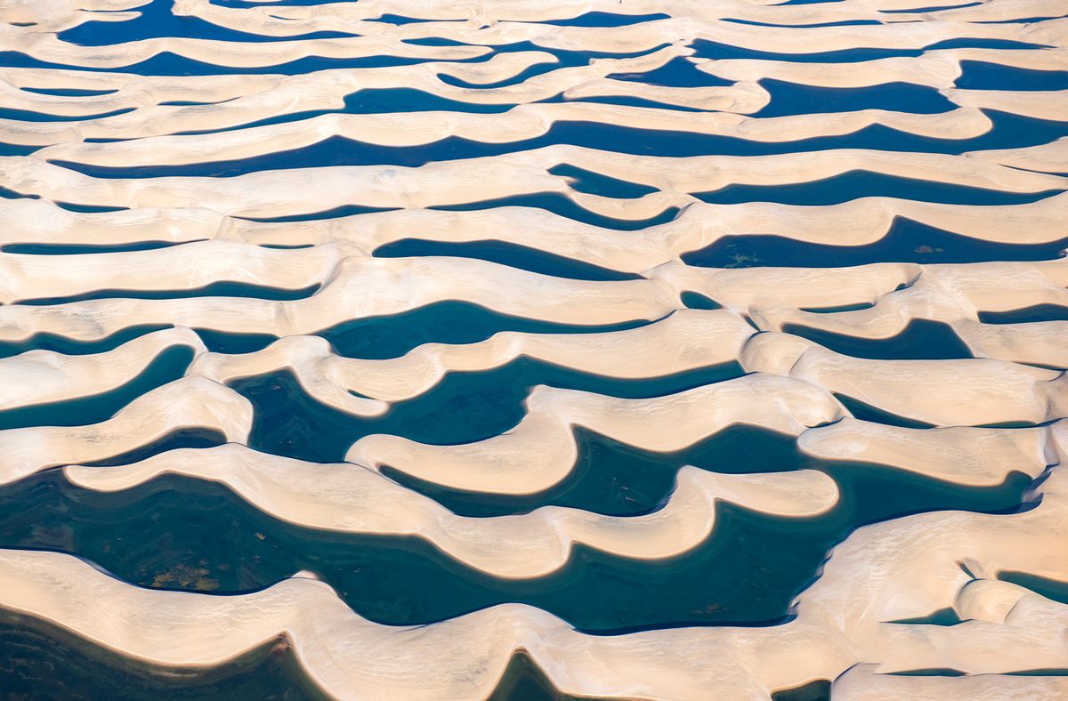 Annual rains pool between the park's massive dunes.