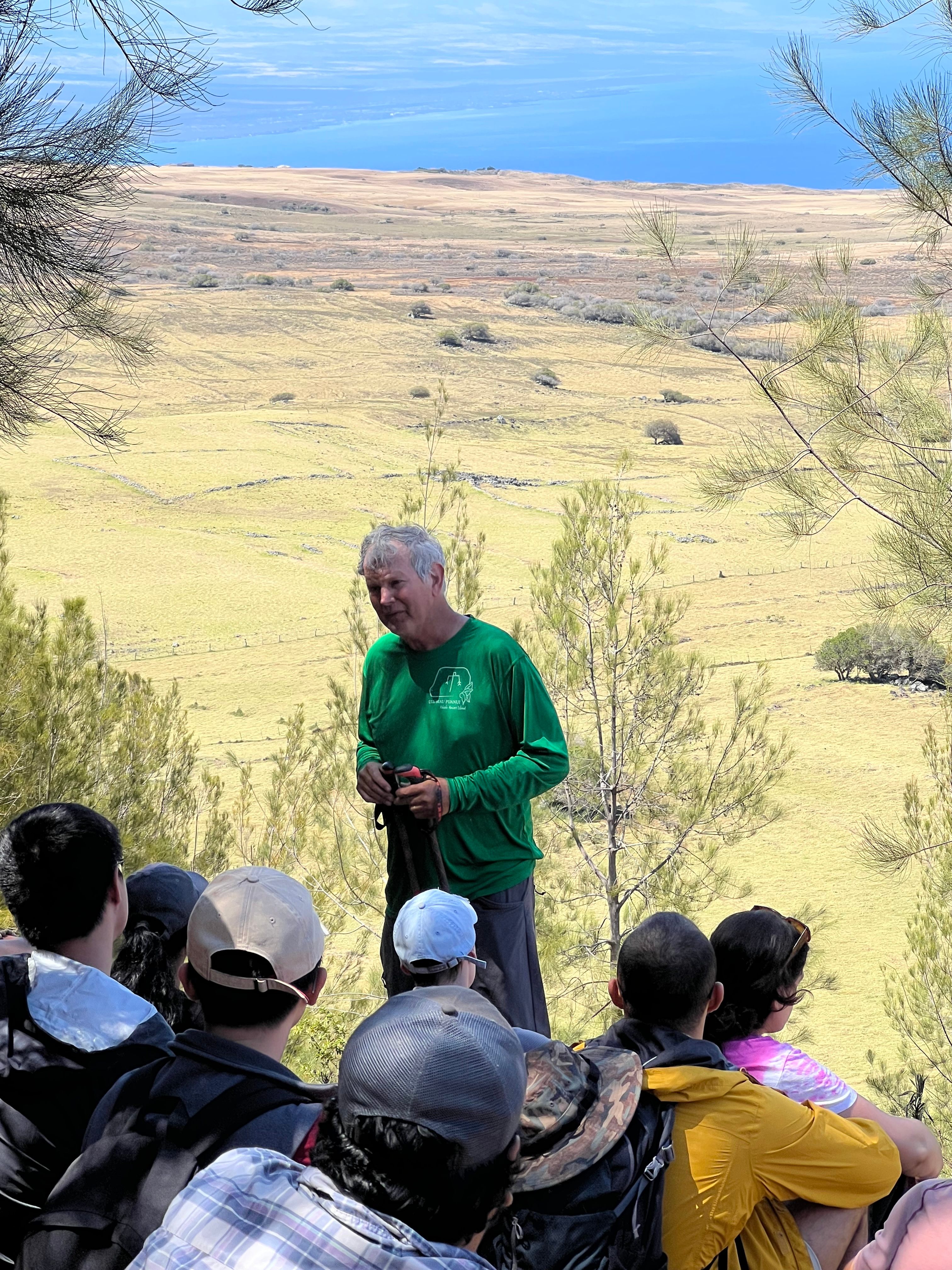 Peter Vitousek, the founder of Ulu Mau Puanui, gives a talk from atop Pu’u Kehena.
