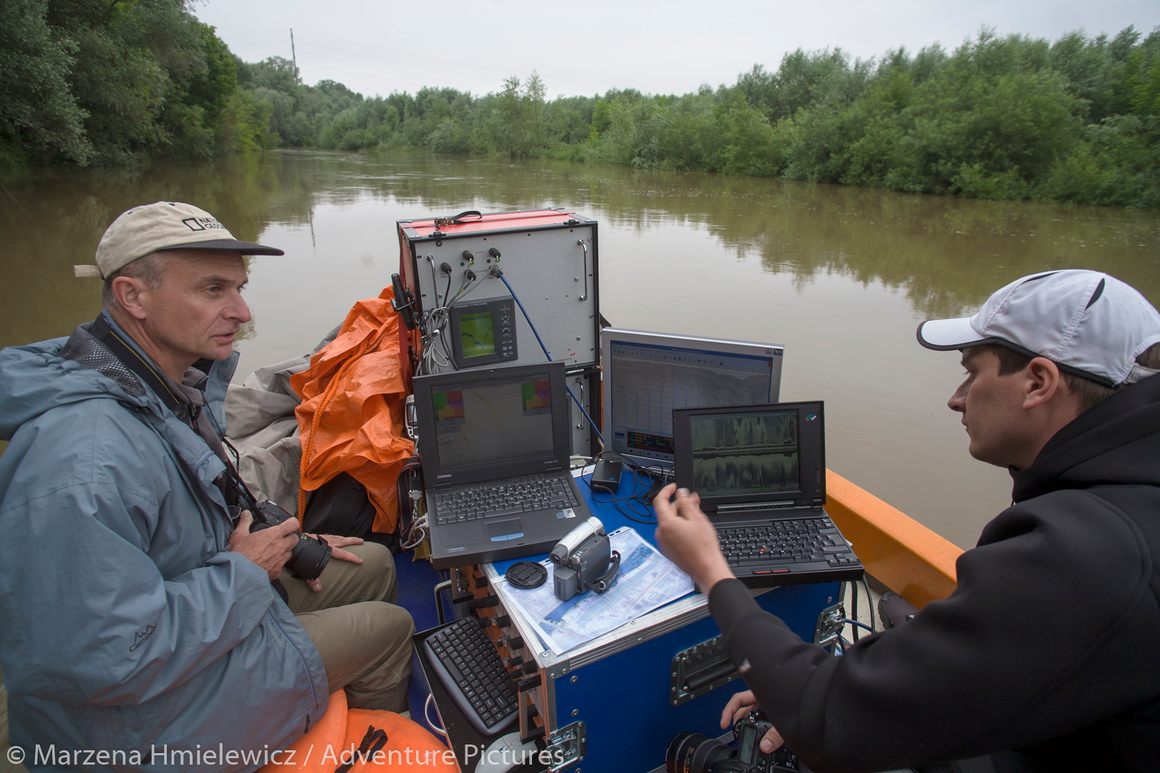 Andrzej Osadczuk (L) and Hubert Kowalski surveying the river