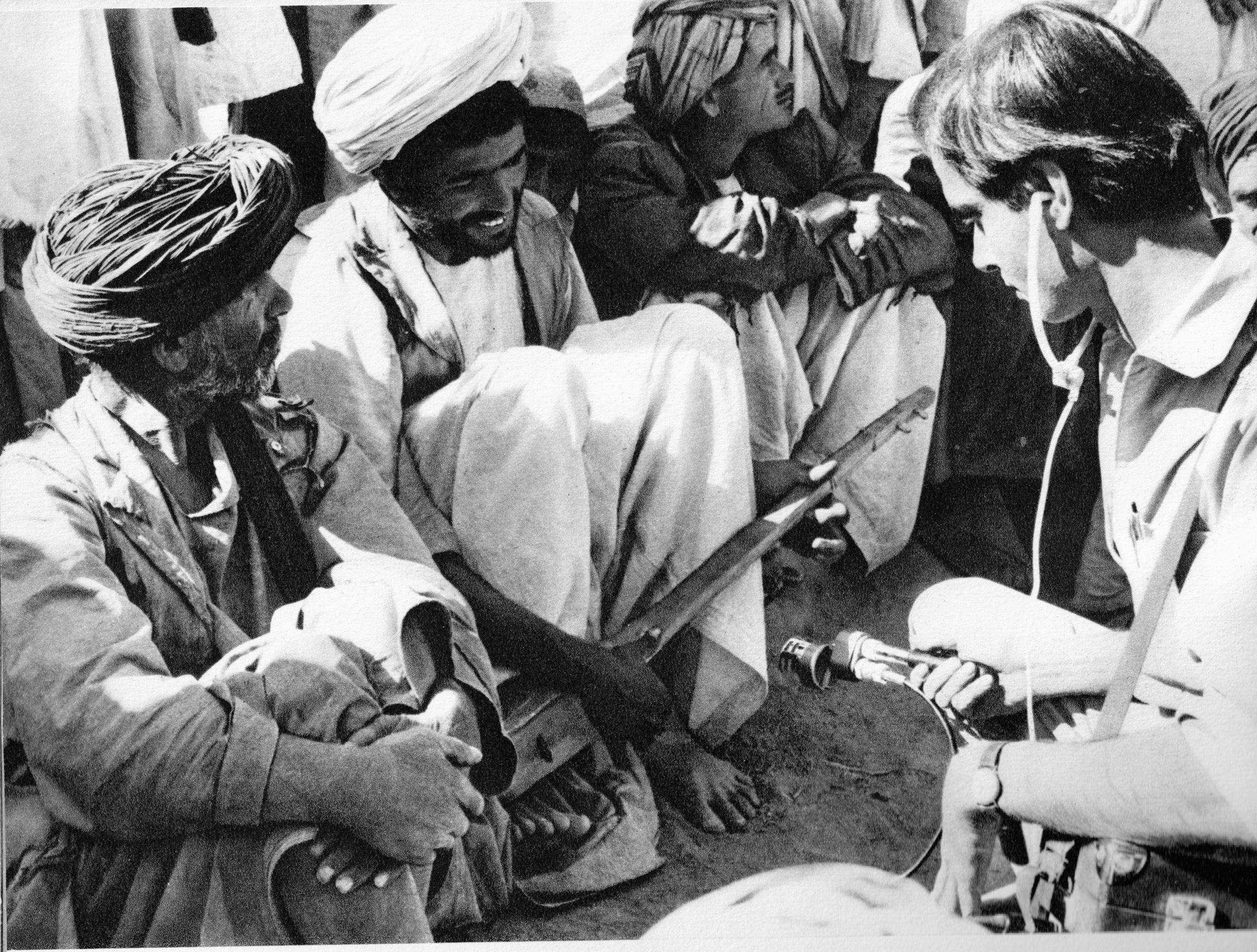 Bhattacharya recording workers at Mundigak, Afghanistan.