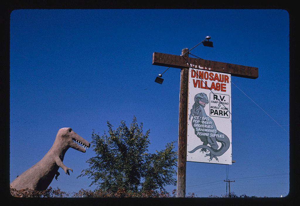<em>Dinosaur Village RV Mobile Home Park, dinosaur statue and sign, Route 40</em>, Utah, 1991. 