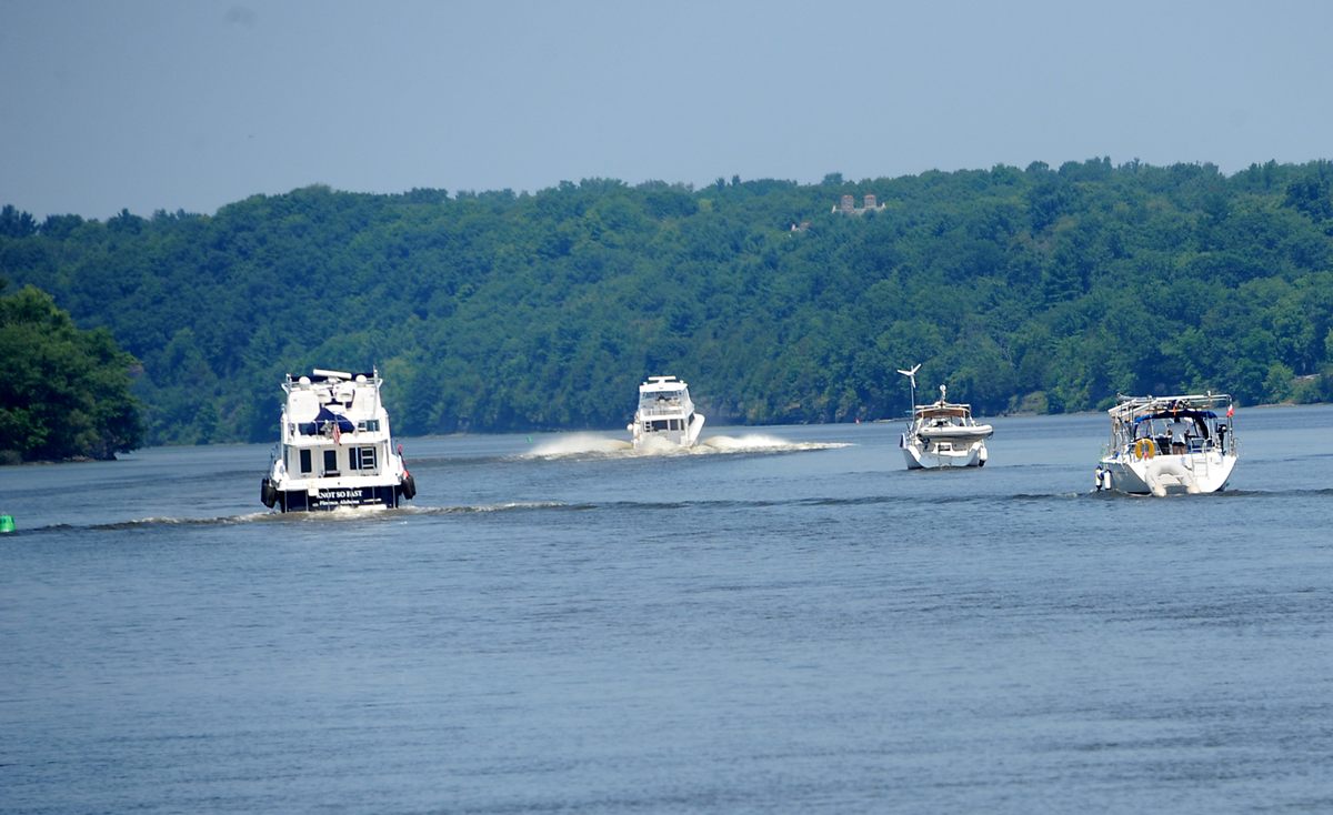 Boats plying New York's state canal system on the Mohawk River north of Albany; canals are important connectors for Loopers.