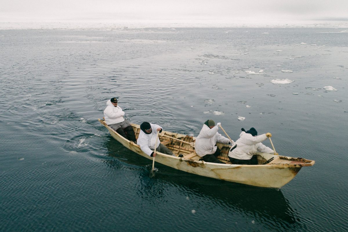 The crew of Quuniq Donovan takes their newly-made umiaq skinboat for a paddle on the Arctic Ocean. Quuniq is one of the youngest new whaling captains, and will continue the unbroken lineage of whaling among the Iñupiat.